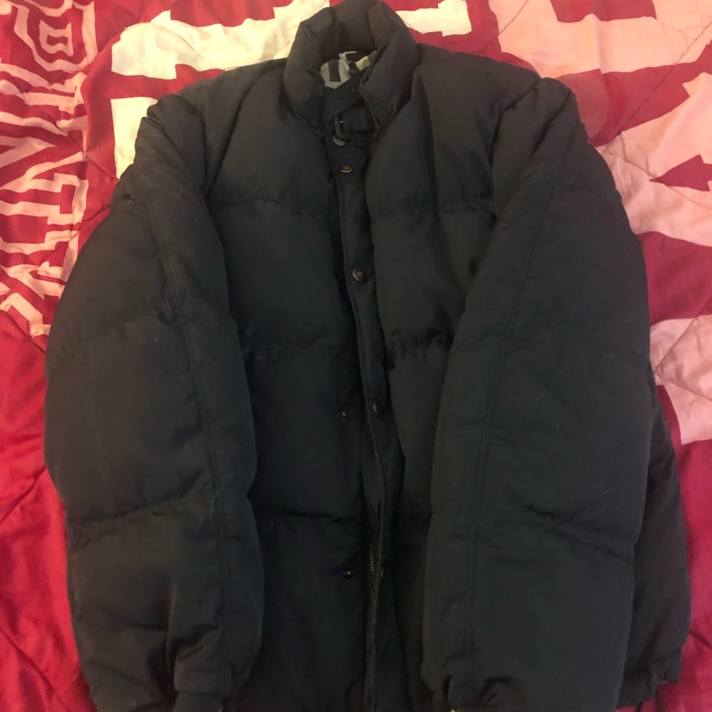 Men’s navy blue Burberry jacket.